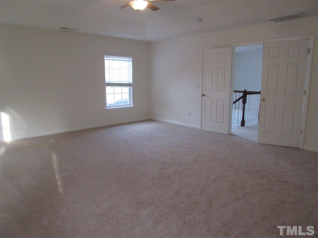 5253 Thornton Road Raleigh, NC 27616 - Photo 12 of 20 a view of empty room with windows
