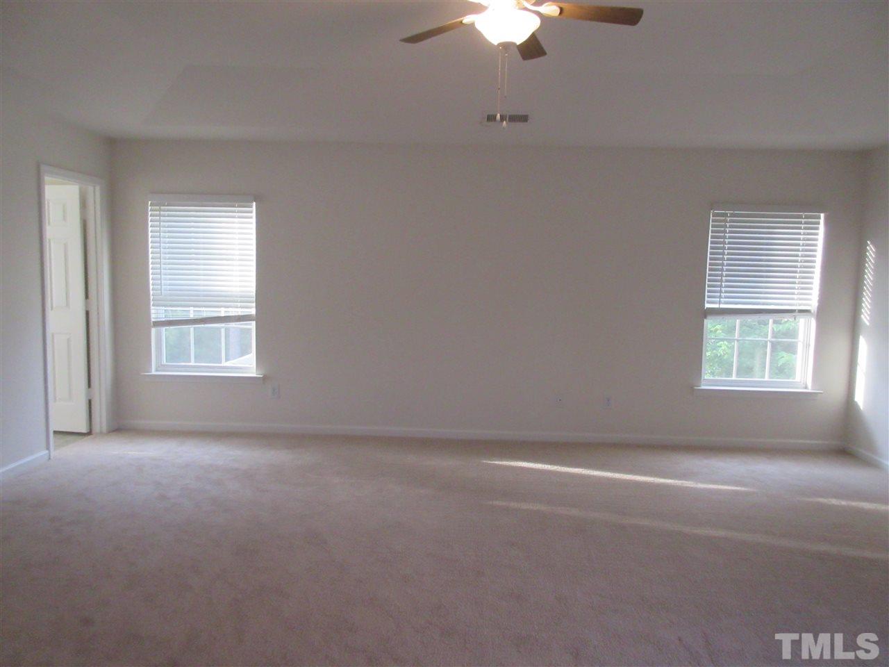 5253 Thornton Road Raleigh, NC 27616 - Photo 14 of 20 an empty room with a window