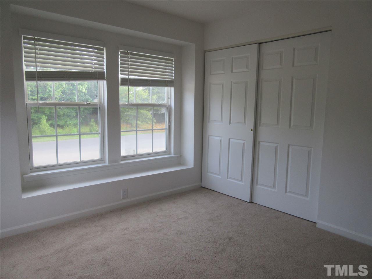5253 Thornton Road Raleigh, NC 27616 - Photo 20 of 20 a view of an empty room with a window