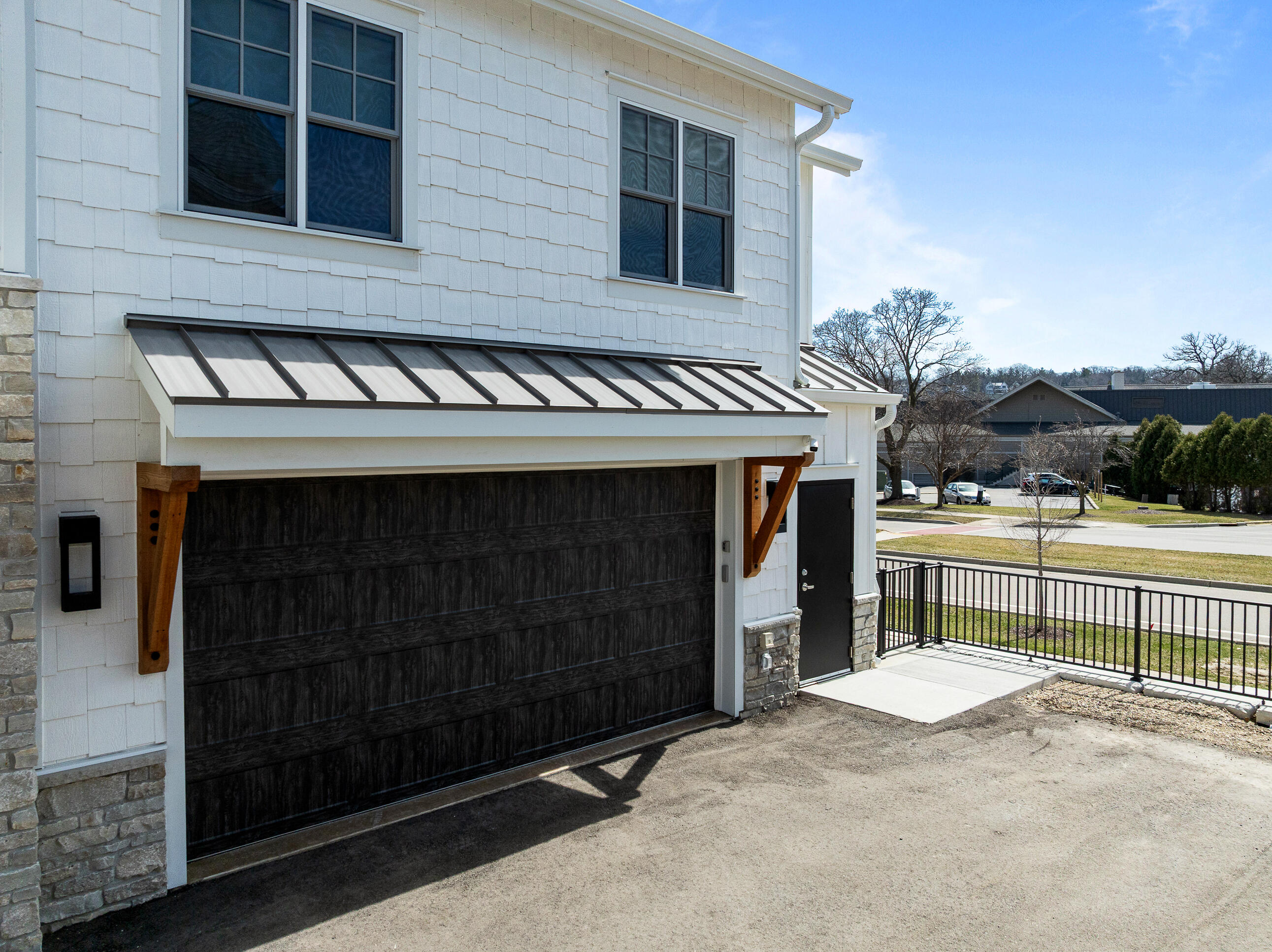 278 High Street, Unit 9 Fontana, WI 53125 - Photo 96 of 115 Outside Garage Entry