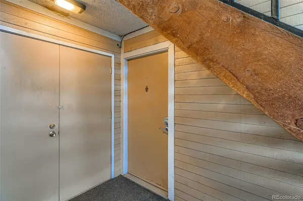 a view of balcony with wooden floor