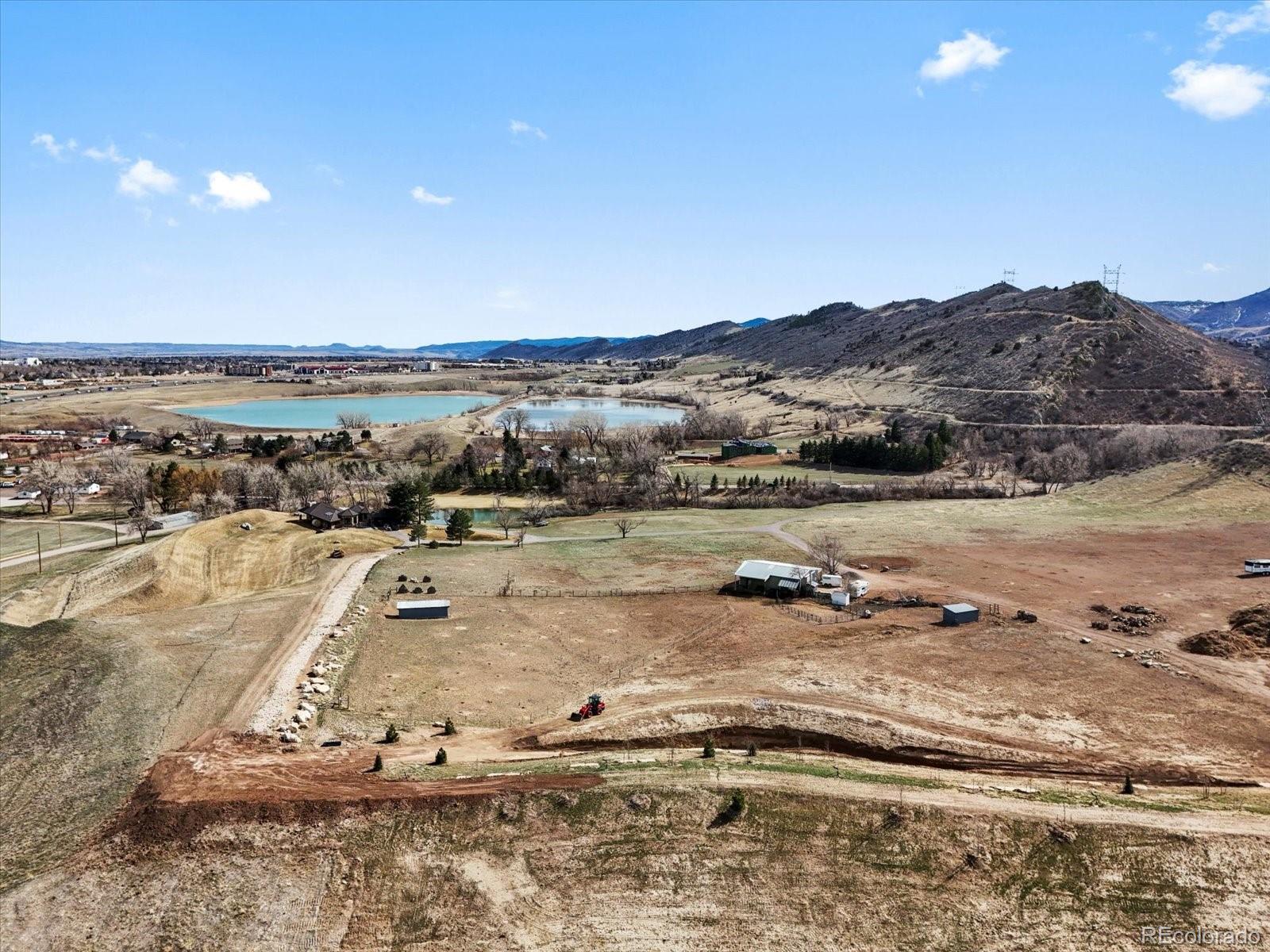 14422 Pansy Loop Morrison, CO 80465 - Photo 29 of 33 a view of a lake with mountain