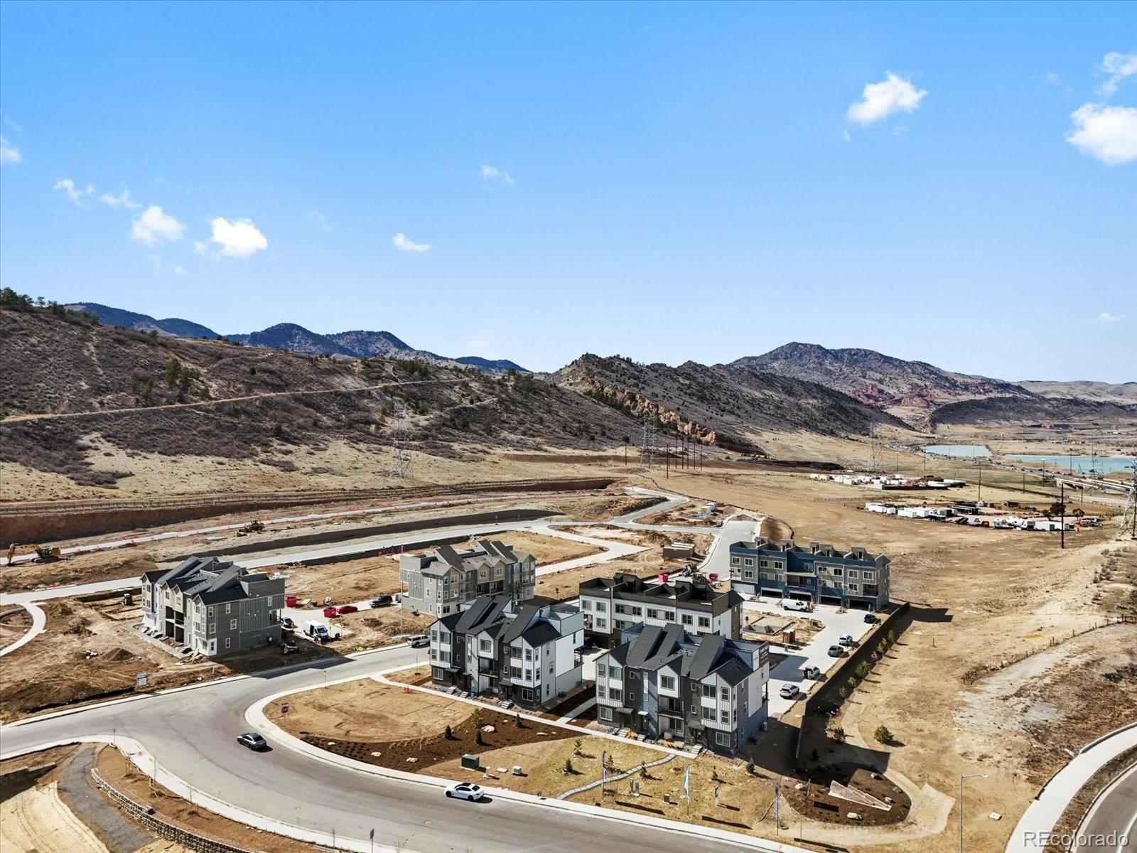 14422 Pansy Loop Morrison, CO 80465 - Photo 33 of 33 a view of a terrace with wooden floor and a mountain view