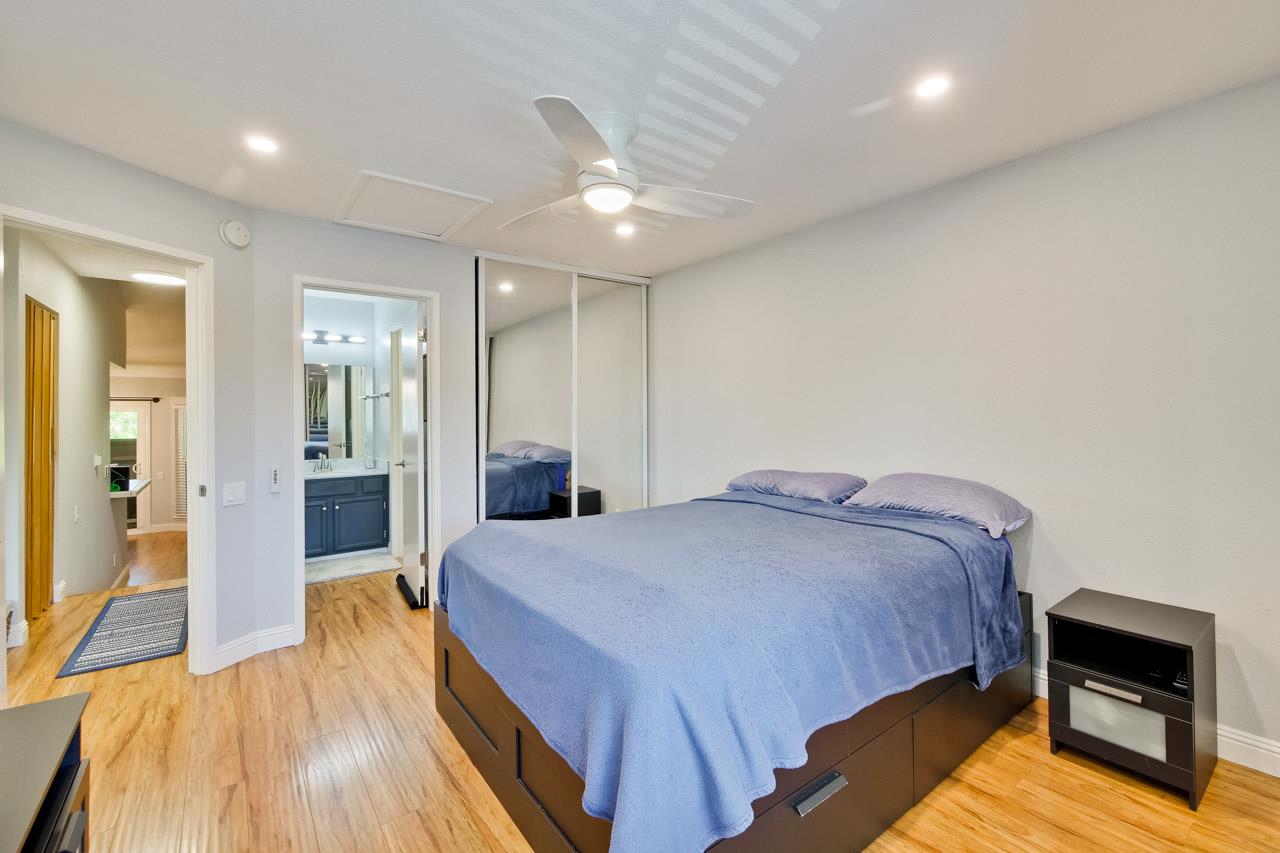 363 Kenbrook Circle San Jose, CA 95111 - Photo 11 of 21 a spacious bedroom with a bed and a view of bathroom