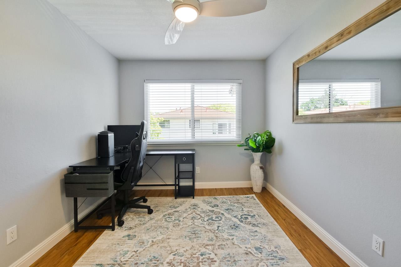 363 Kenbrook Circle San Jose, CA 95111 - Photo 12 of 21 a view of a workspace with furniture and a window