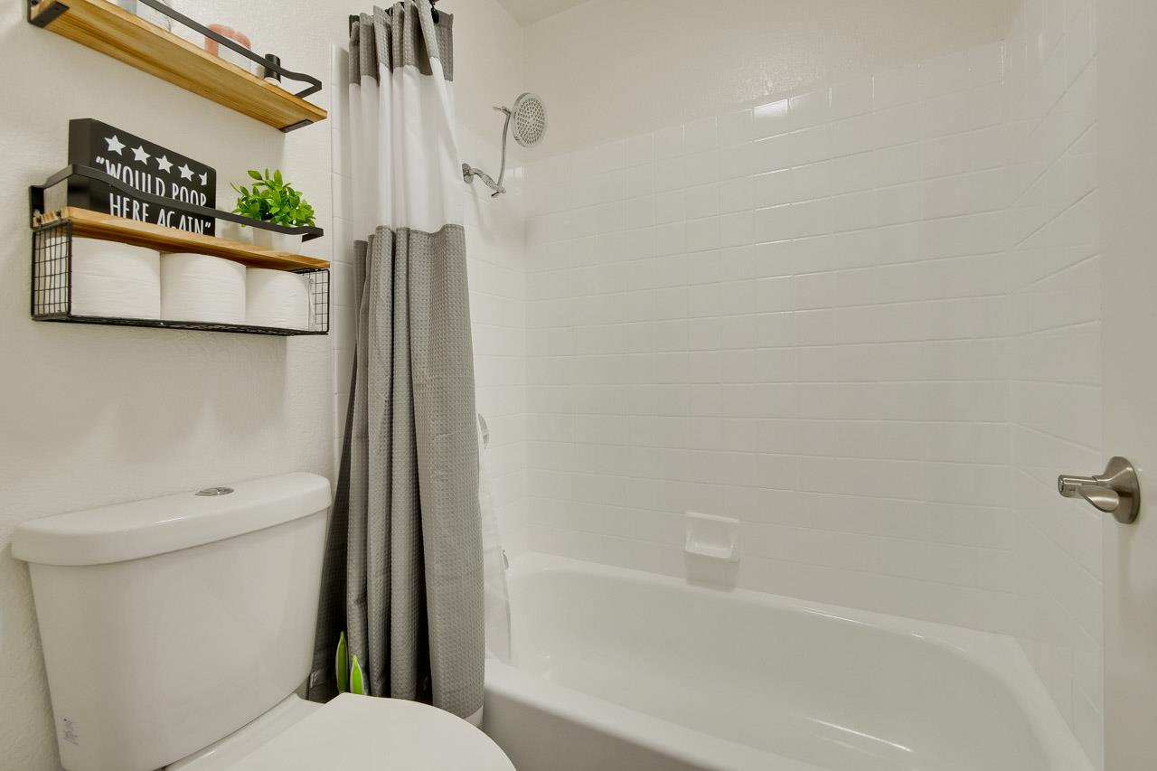 363 Kenbrook Circle San Jose, CA 95111 - Photo 14 of 21 a bathroom with a toilet and a shower