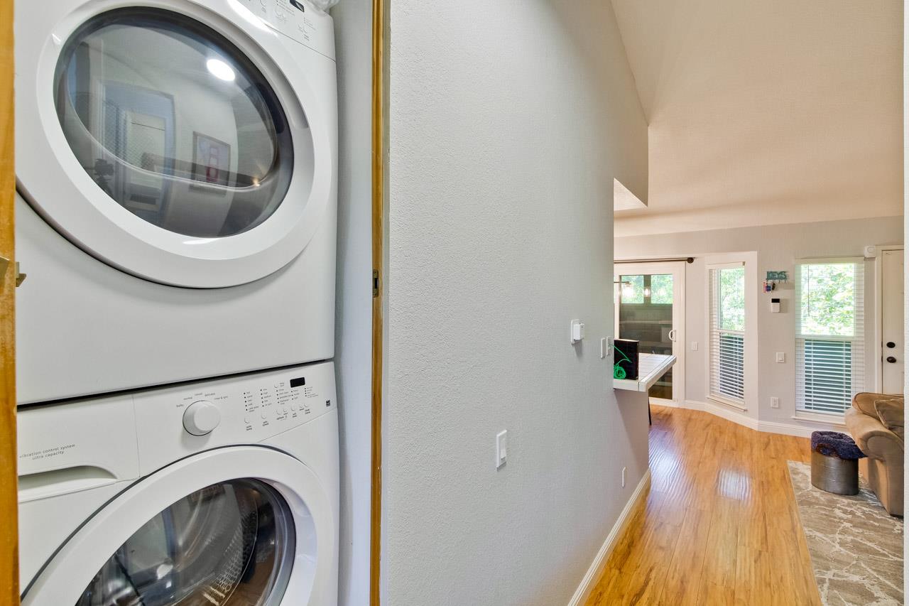 363 Kenbrook Circle San Jose, CA 95111 - Photo 15 of 21 a view of a hallway with washer and dryer