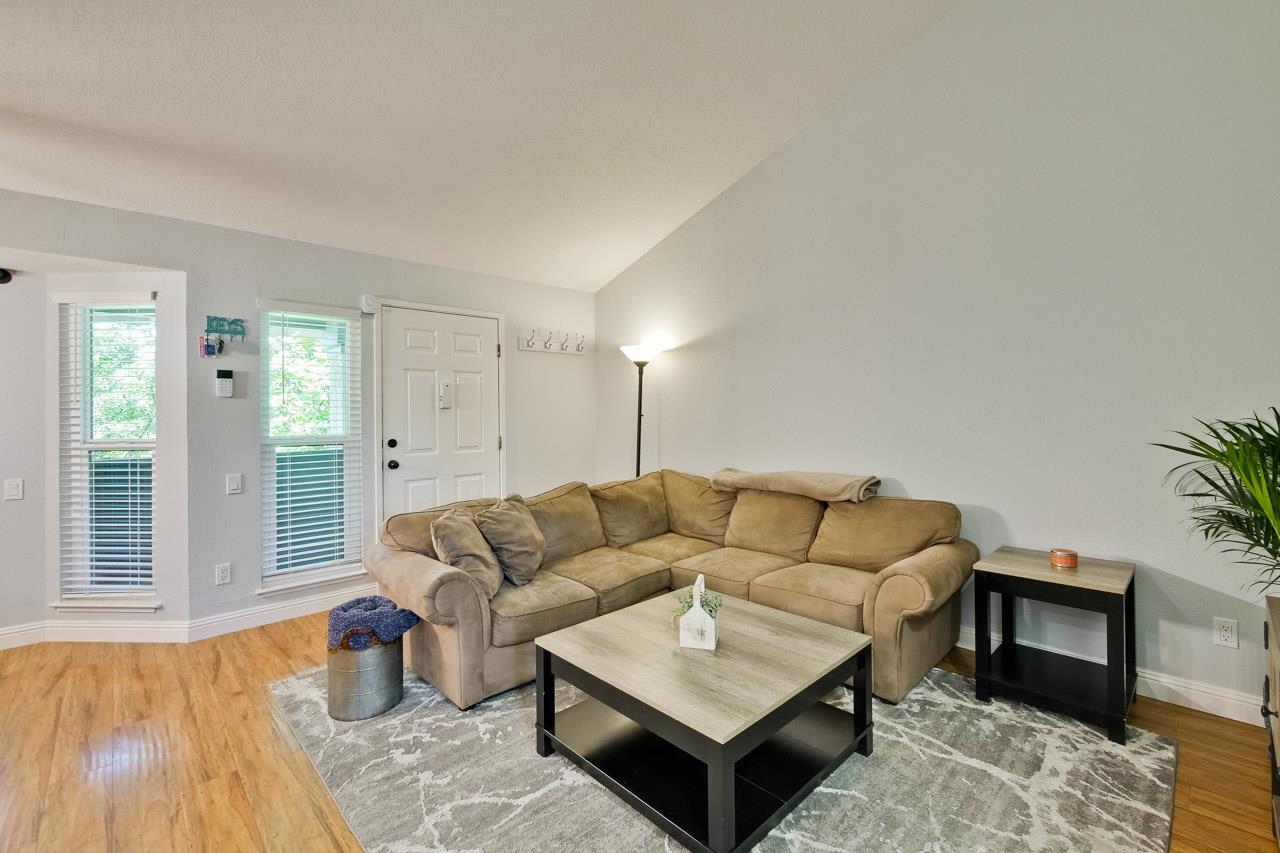 363 Kenbrook Circle San Jose, CA 95111 - Photo 4 of 21 a living room with furniture and a wooden floor