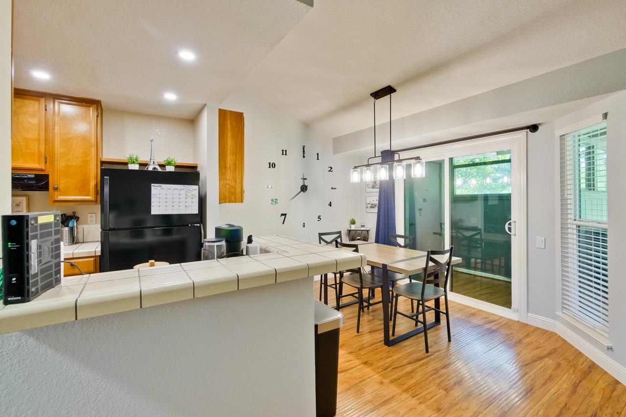 363 Kenbrook Circle San Jose, CA 95111 - Photo 7 of 21 a living room with furniture and wooden floor