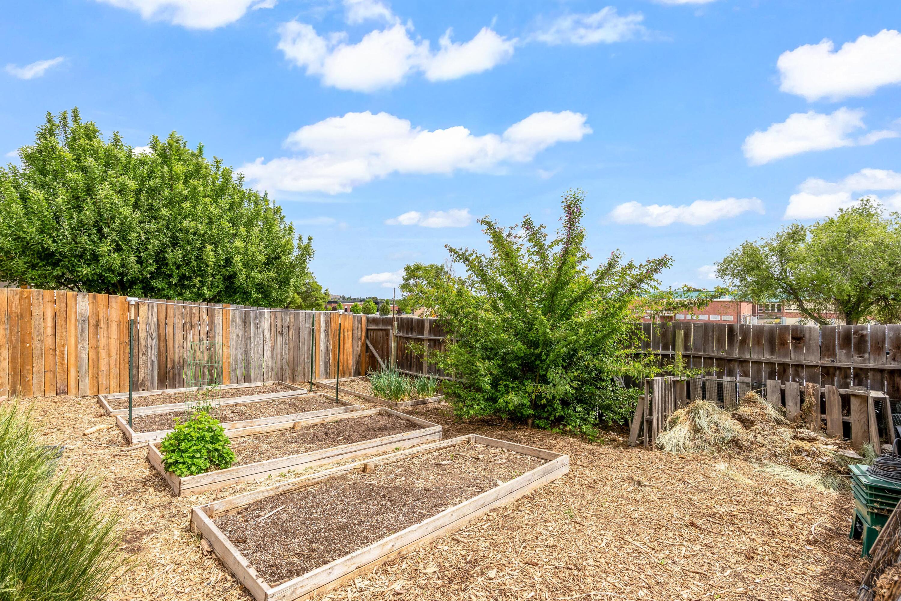 496 Southwest 2nd Street Madras, OR 97741 - Photo 29 of 37 a view of a backyard with sitting area
