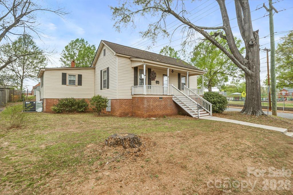 625 North Main Street Kannapolis, NC 28081 - Photo 2 of 26 a view of a house with a yard