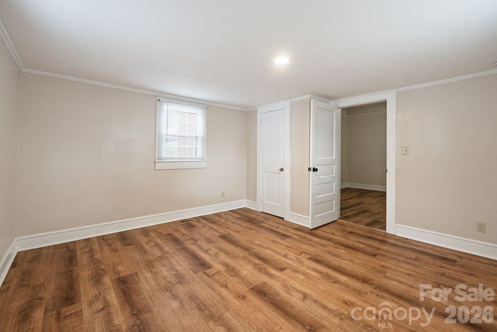 625 North Main Street Kannapolis, NC 28081 - Photo 21 of 26 wooden floor in an empty room