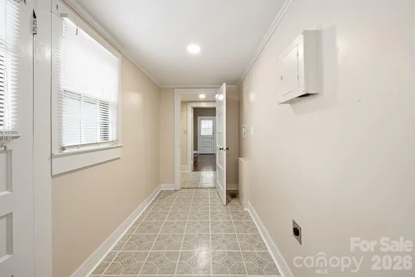 a bathroom with a shower and a sink