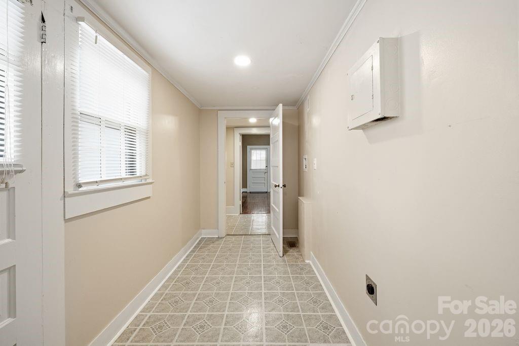 625 North Main Street Kannapolis, NC 28081 - Photo 22 of 26 a view of an empty room with wooden floor and a window