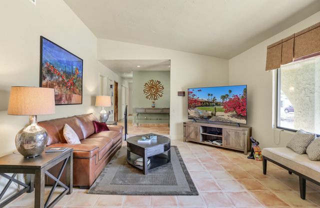 a living room with furniture and a couch
