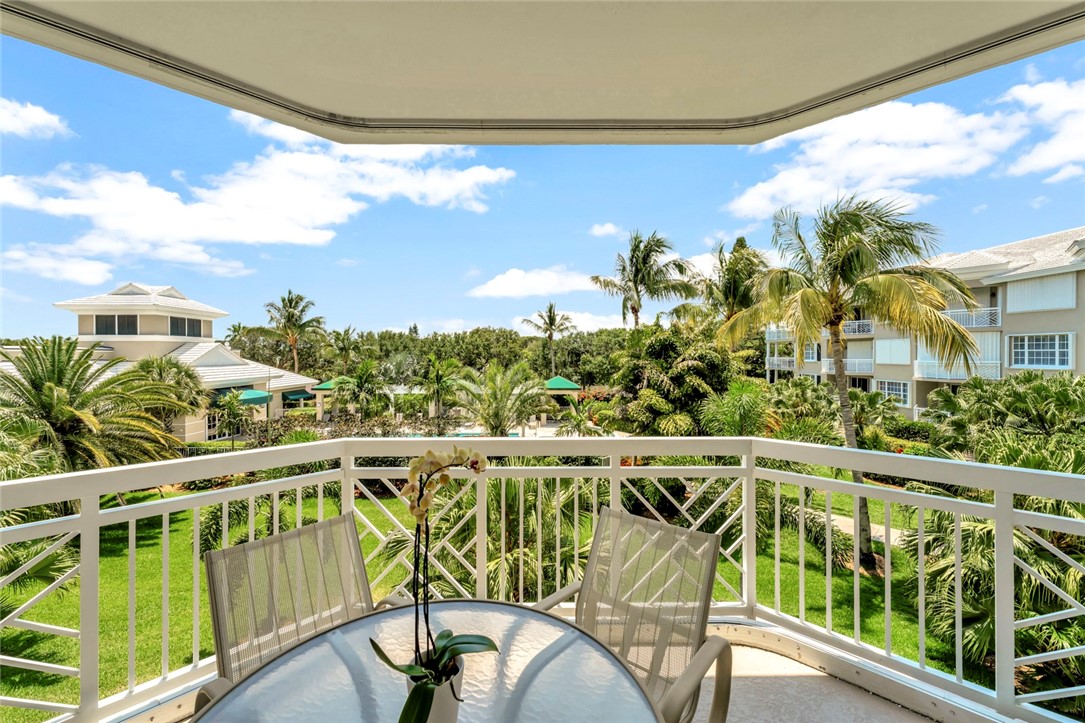 940 Turtle Cove Lane, Unit 208 Vero Beach, FL 32963 - Photo 12 of 35 a view of a balcony with lake view