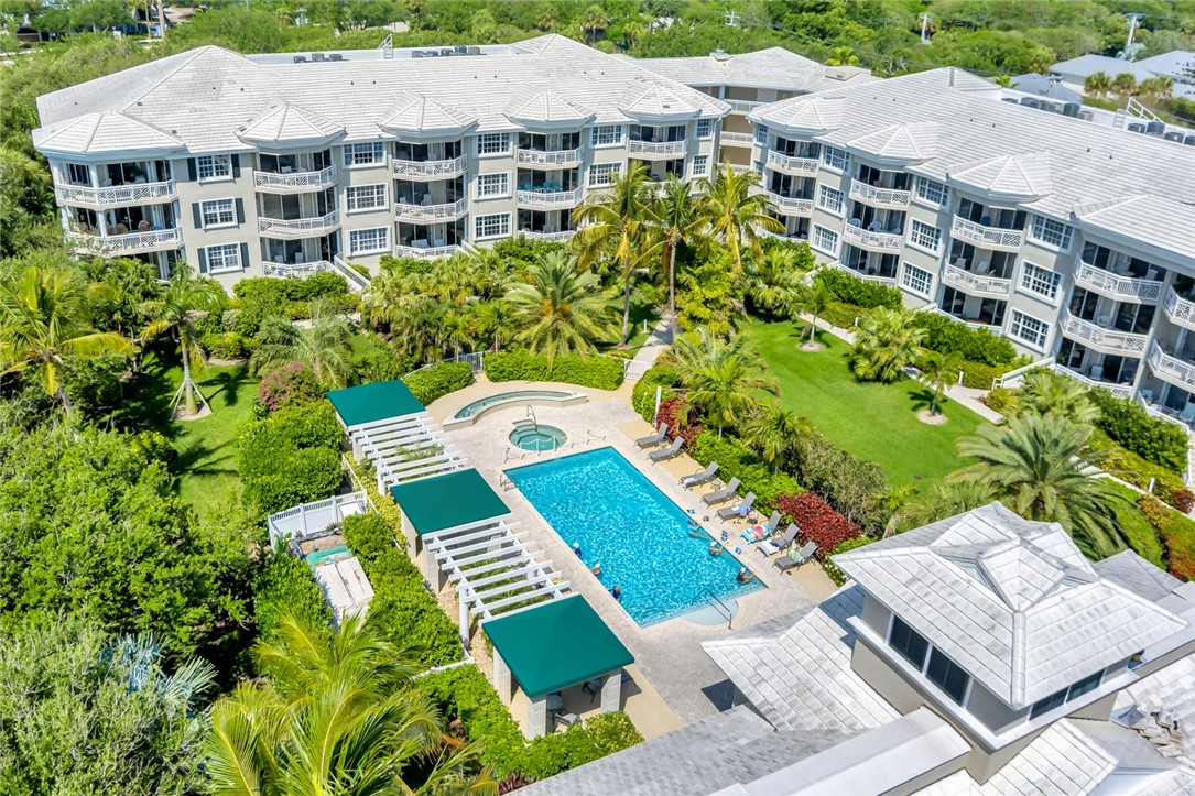 940 Turtle Cove Lane, Unit 208 Vero Beach, FL 32963 - Photo 2 of 35 a view of a city with tall buildings