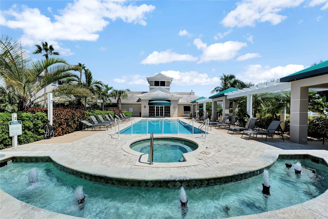 940 Turtle Cove Lane, Unit 208 Vero Beach, FL 32963 - Photo 30 of 35 a view of a house with backyard