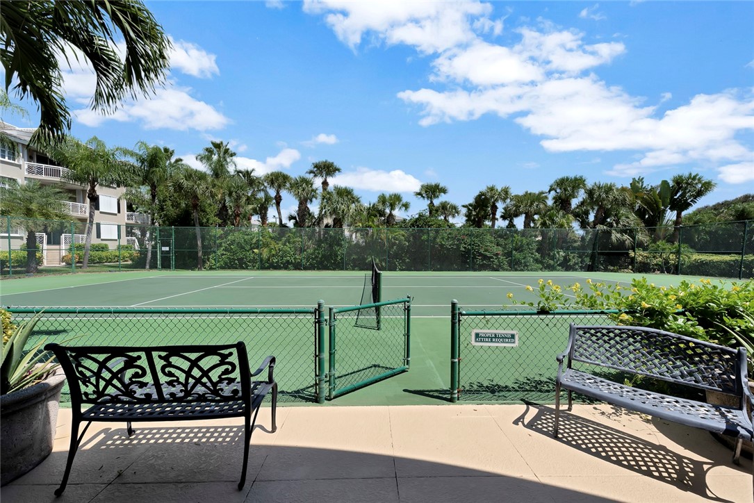940 Turtle Cove Lane, Unit 208 Vero Beach, FL 32963 - Photo 31 of 35 a view of a bench in a park