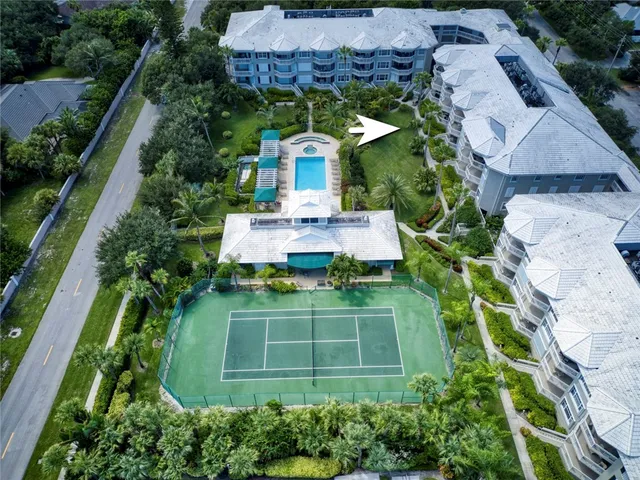 an aerial view of a house with a garden