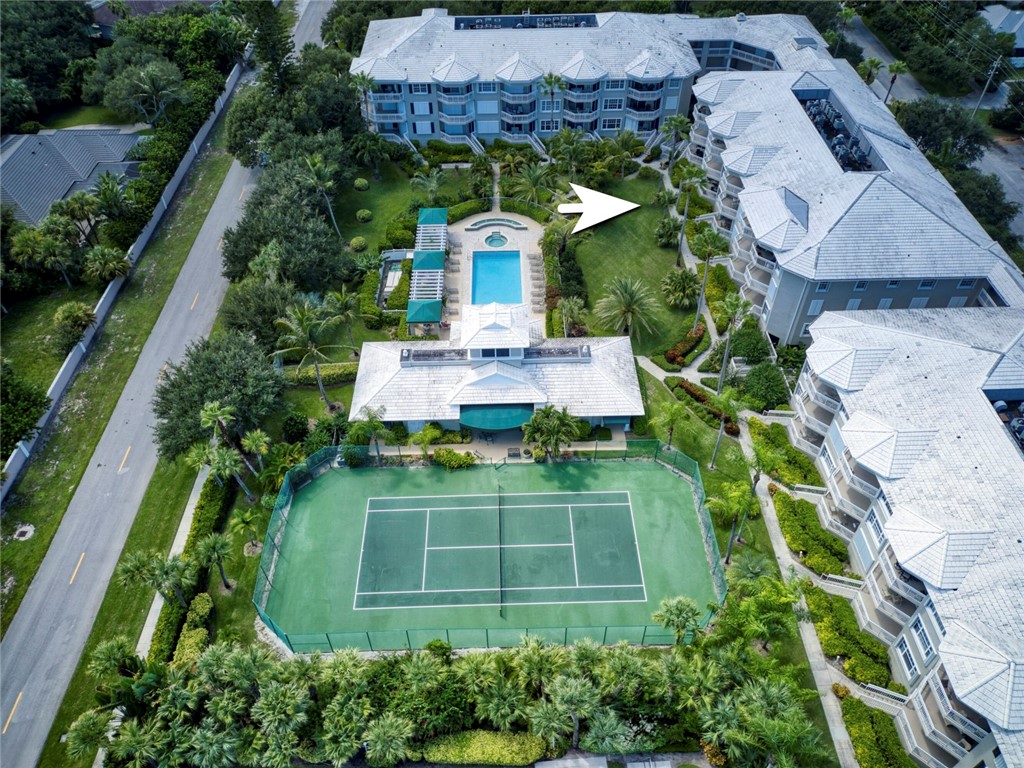 940 Turtle Cove Lane, Unit 208 Vero Beach, FL 32963 - Photo 32 of 35 an aerial view of a house with a garden
