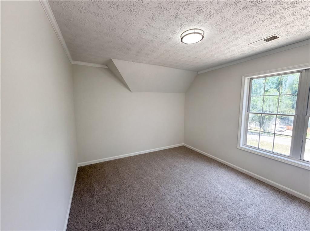 722 Ridgetop Road Bethlehem, GA 30620 - Photo 13 of 23 an empty room with windows