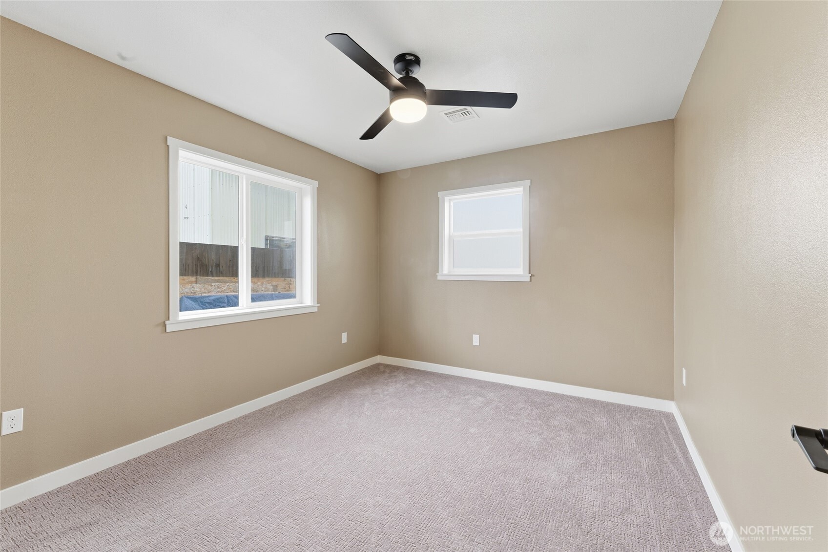 905 Cowl Street Milton Freewater, OR 97862 - Photo 14 of 32 a view of an empty room with a window