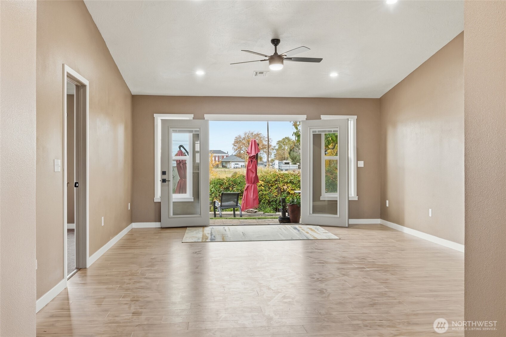 905 Cowl Street Milton Freewater, OR 97862 - Photo 3 of 32 a view of an entryway with wooden floor