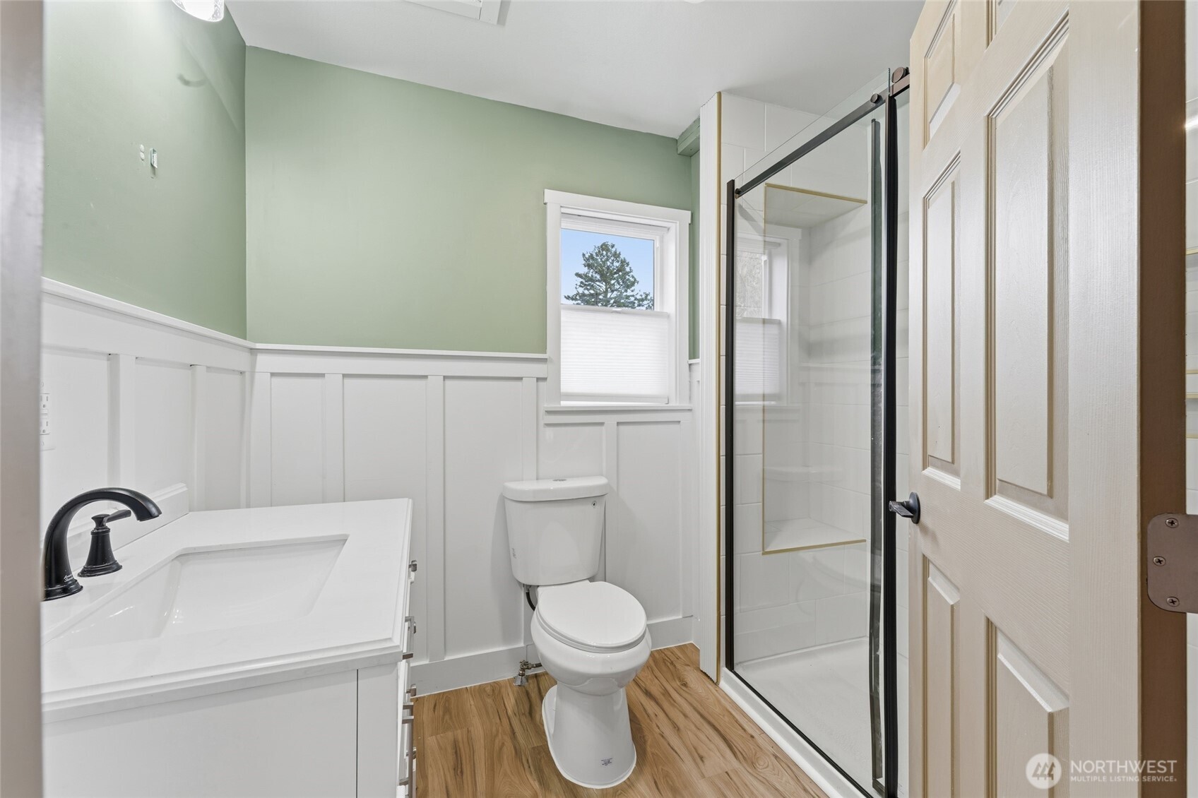 905 Cowl Street Milton Freewater, OR 97862 - Photo 6 of 32 a bathroom with a toilet a sink and a shower