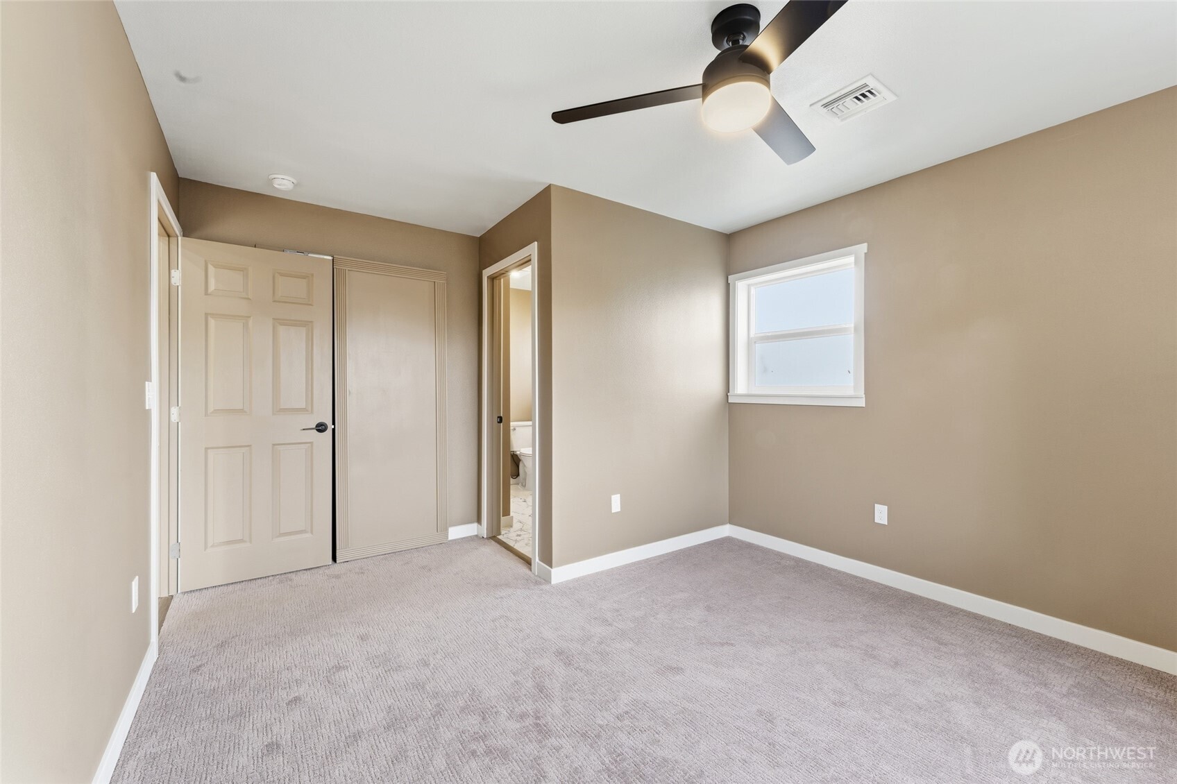905 Cowl Street Milton Freewater, OR 97862 - Photo 10 of 32 a view of an empty room with a window