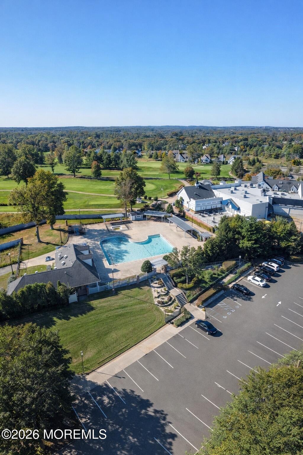 8 Patton Court Manalapan, NJ 07726 - Photo 21 of 23 an aerial view of a city with lots of residential buildings and mountain view in back