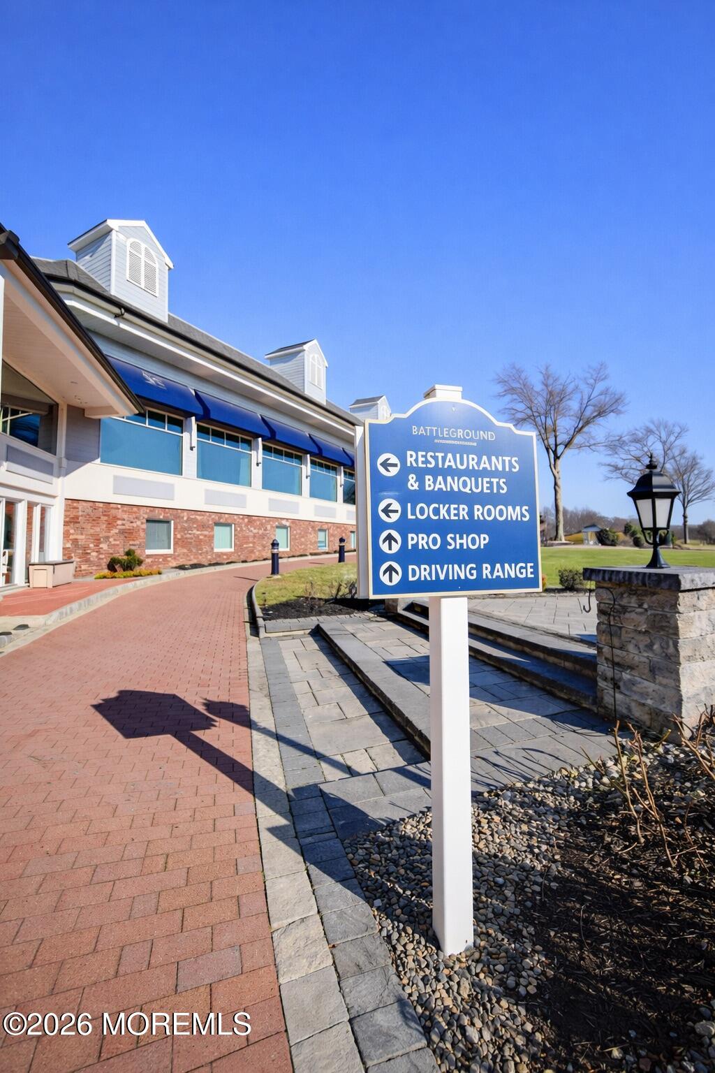 8 Patton Court Manalapan, NJ 07726 - Photo 22 of 23 a view of a street with benches
