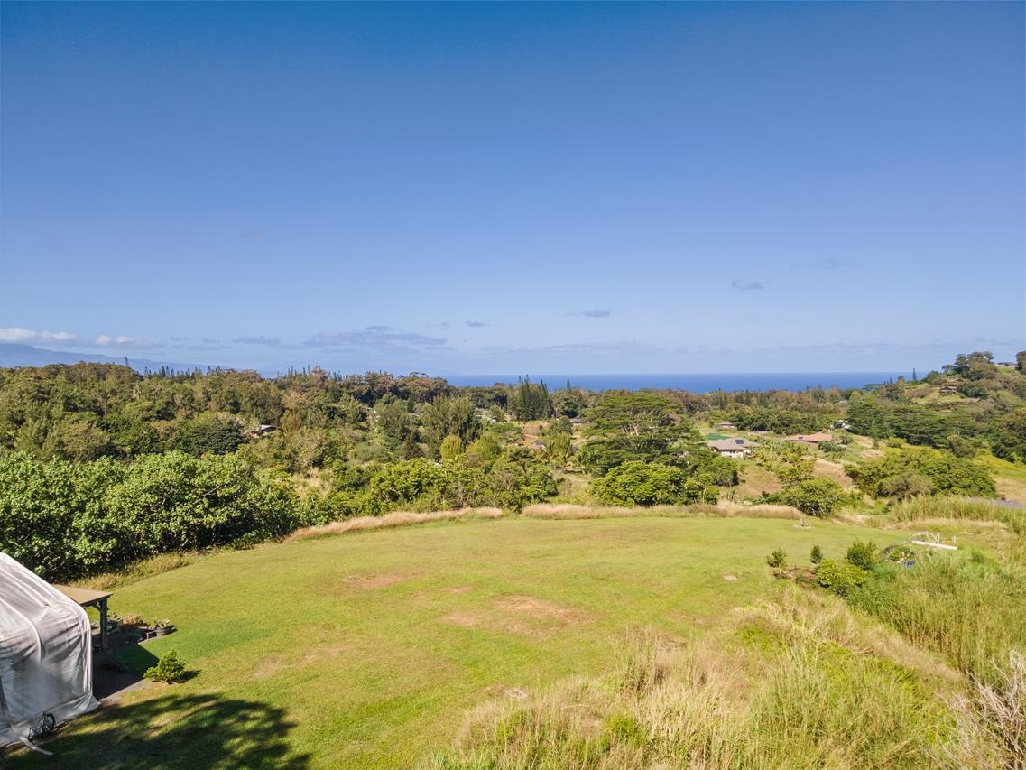 676 Kaupakalua Road, Unit A Haiku, HI 96708 - Photo 19 of 21 a view of an ocean