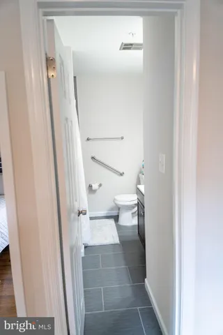 a bathroom with a sink and a toilet