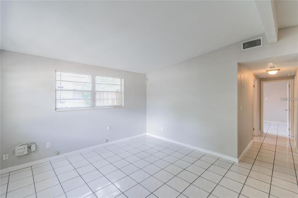 1911 West St Conrad Street Tampa, FL 33607 - Photo 12 of 35 a view of an empty room and window