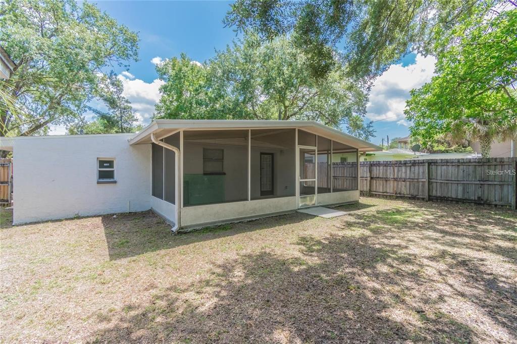 1911 West St Conrad Street Tampa, FL 33607 - Photo 30 of 35 a view of a house with a yard