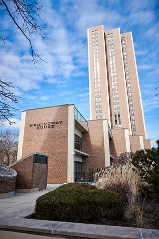 a view of a brick wall of building