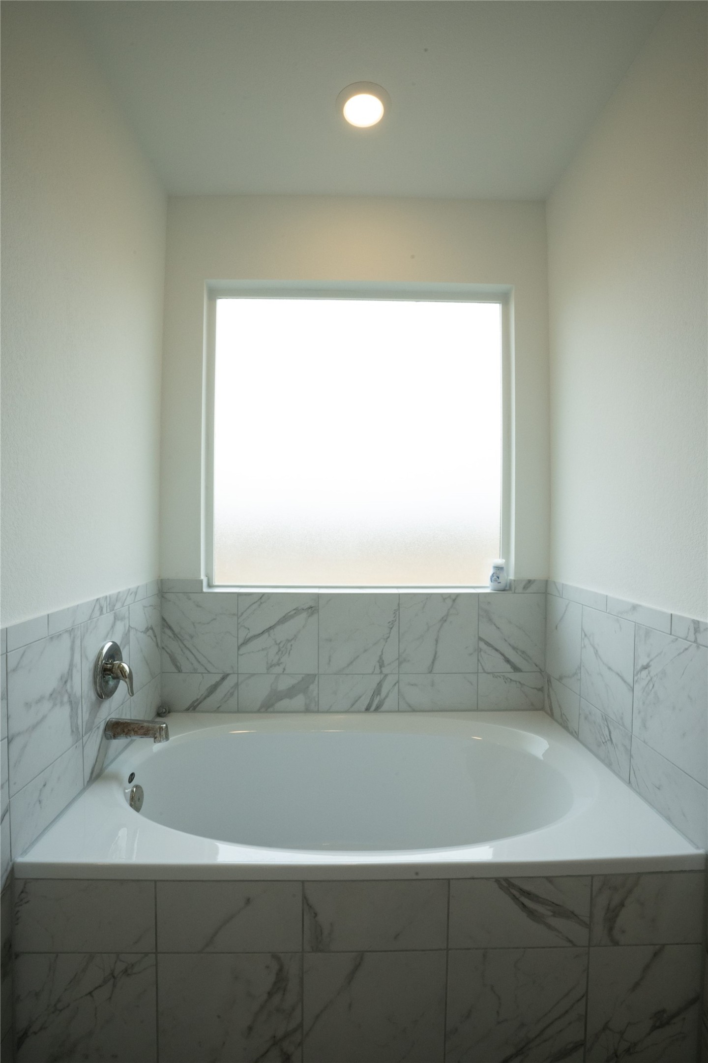 105 Carmello Kyle, TX 78640 - Photo 10 of 30 Full bath featuring a bath, plenty of natural light, and recessed lighting