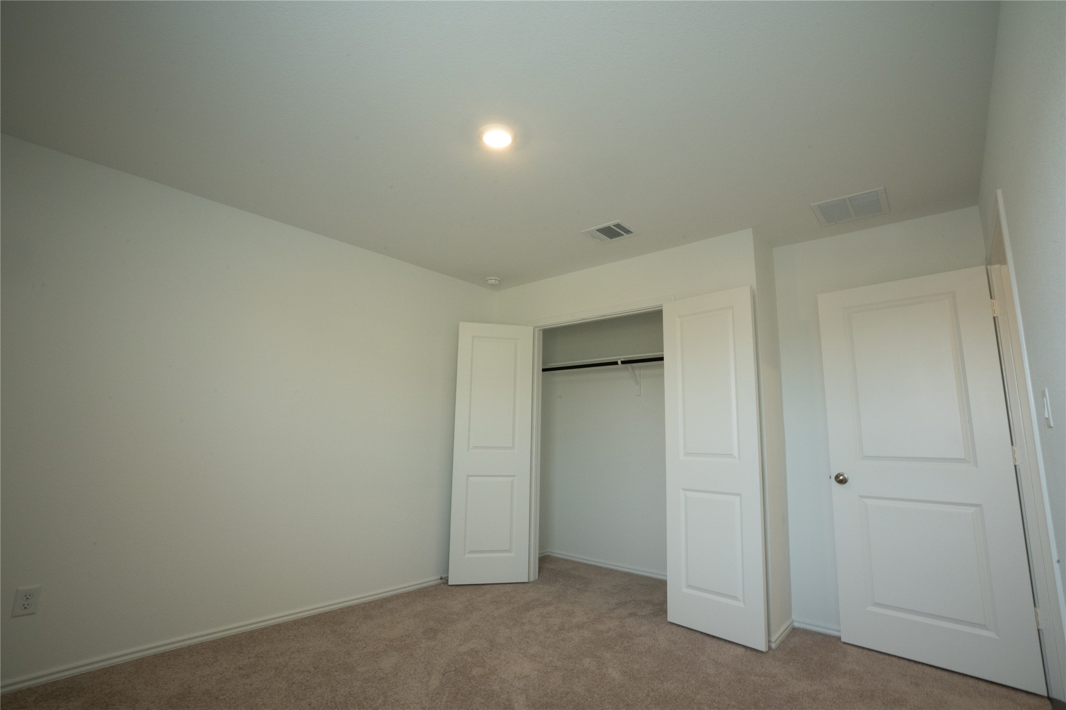 105 Carmello Kyle, TX 78640 - Photo 18 of 30 Unfurnished bedroom with carpet flooring and a closet