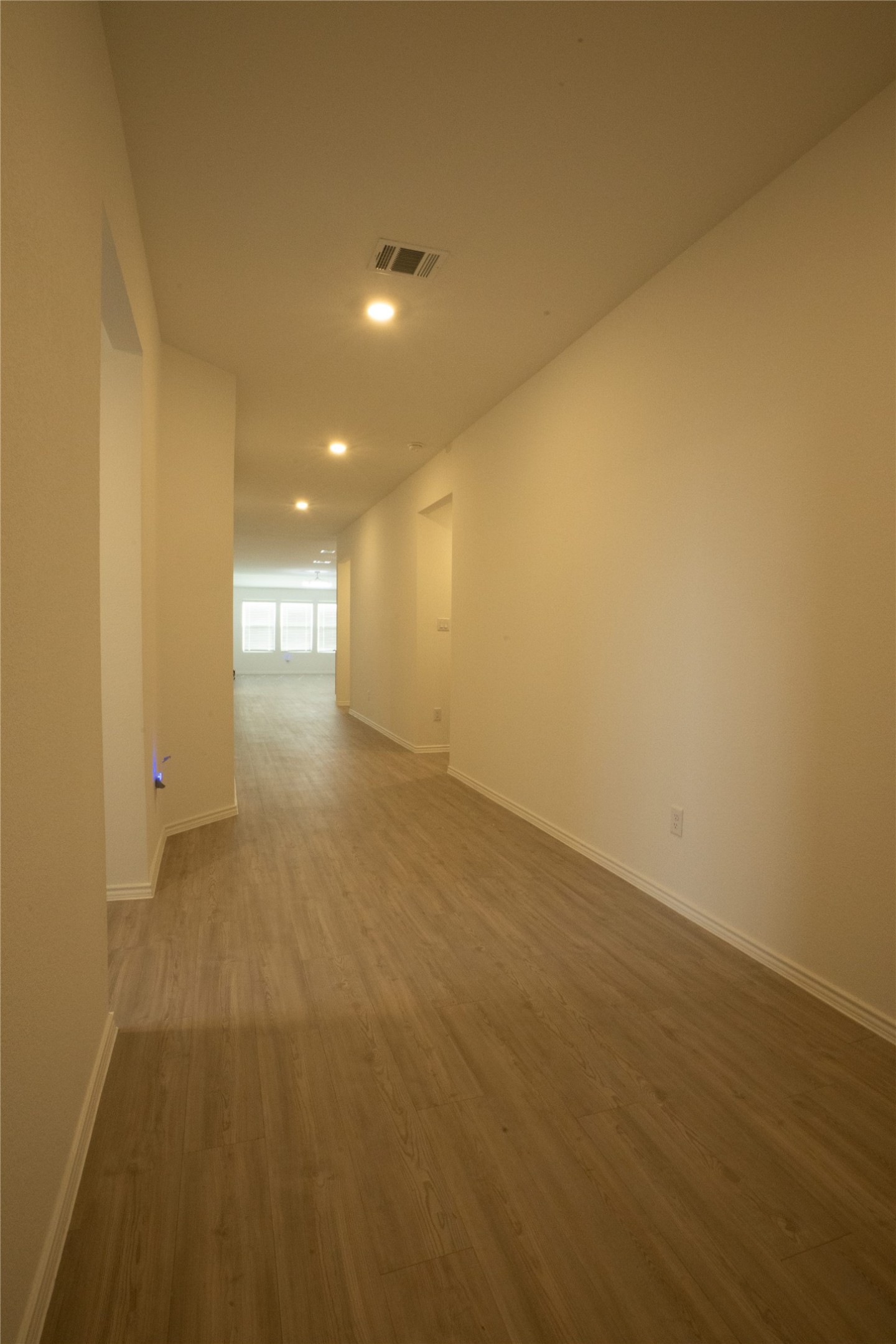 105 Carmello Kyle, TX 78640 - Photo 19 of 30 Unfurnished room featuring dark wood-type flooring and recessed lighting