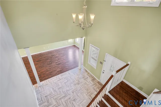 a view of a hallway with staircase