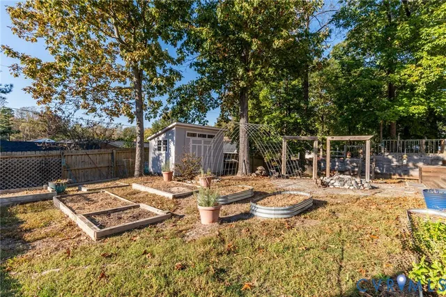 a view of a backyard with sitting area