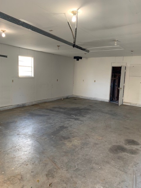 180 Dorris Road Portland, TN 37148 - Photo 11 of 19 an empty room with a empty space and a ceiling fan