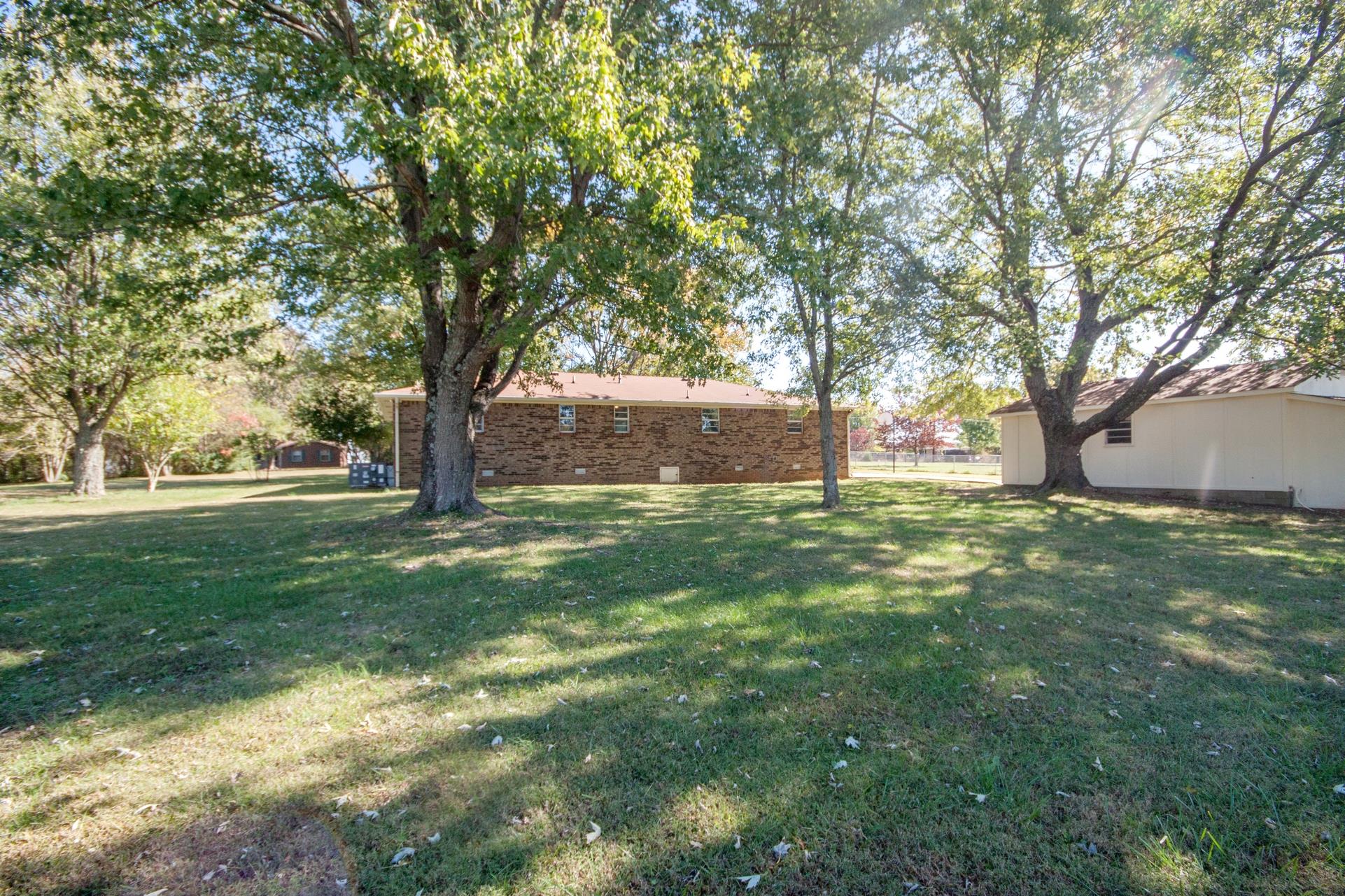 180 Dorris Road Portland, TN 37148 - Photo 13 of 19 a view of yard with trees