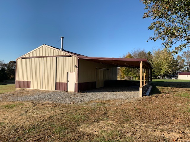 180 Dorris Road Portland, TN 37148 - Photo 18 of 19 a view of a house with a yard