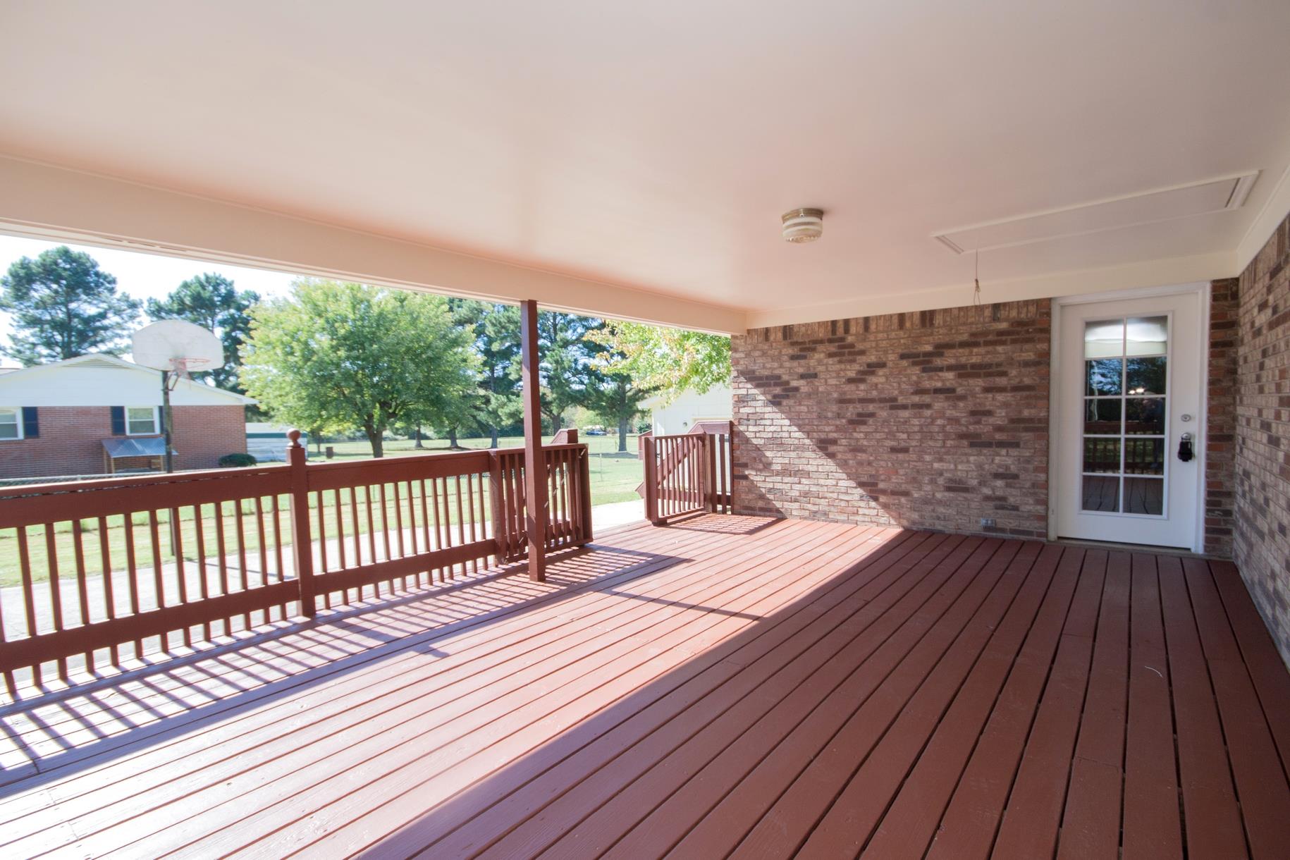 180 Dorris Road Portland, TN 37148 - Photo 5 of 19 a view of balcony with wooden floor and fence