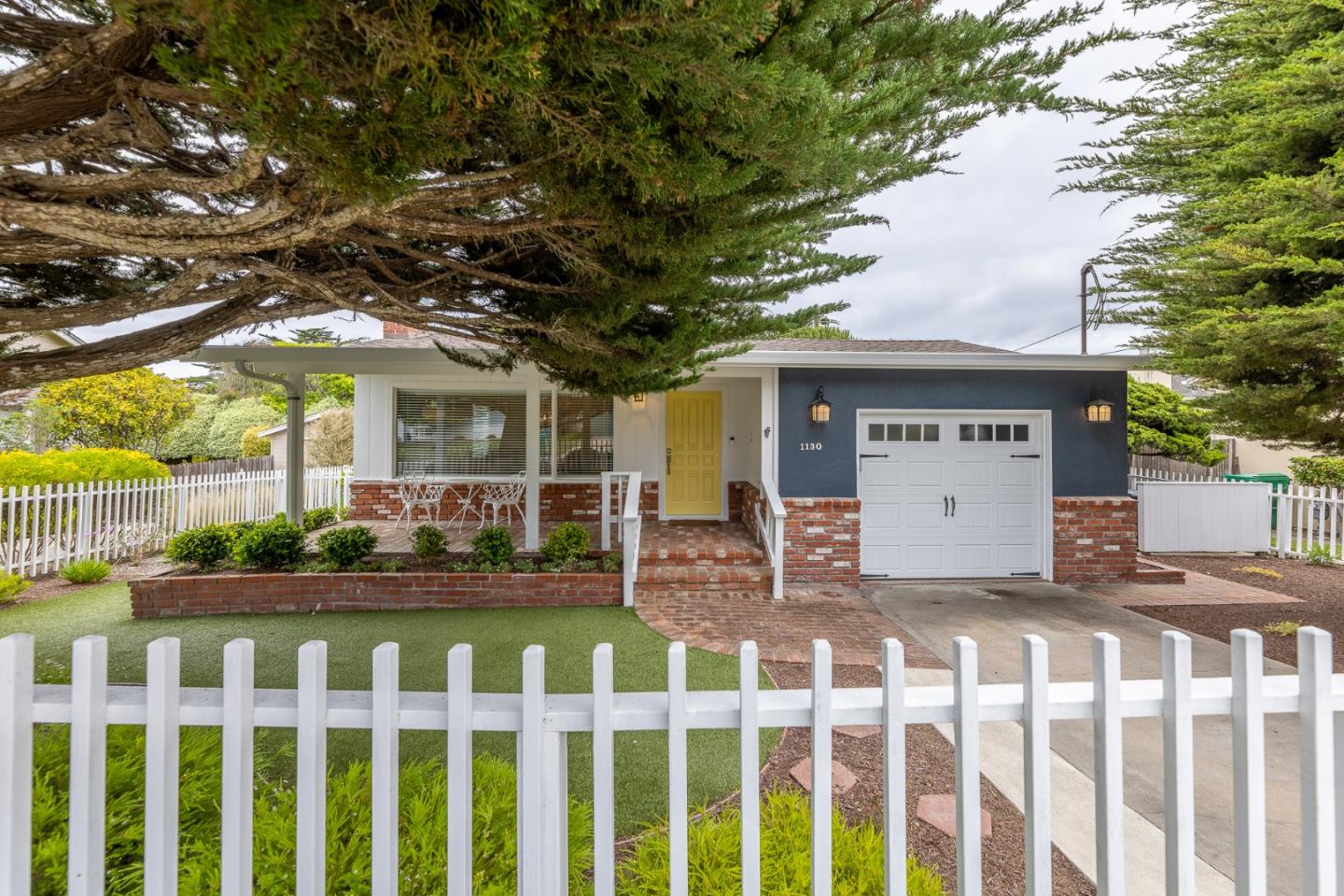 1130 Ripple Avenue Pacific Grove, CA 93950 - Photo 1 of 38 a view of a house with wooden fence