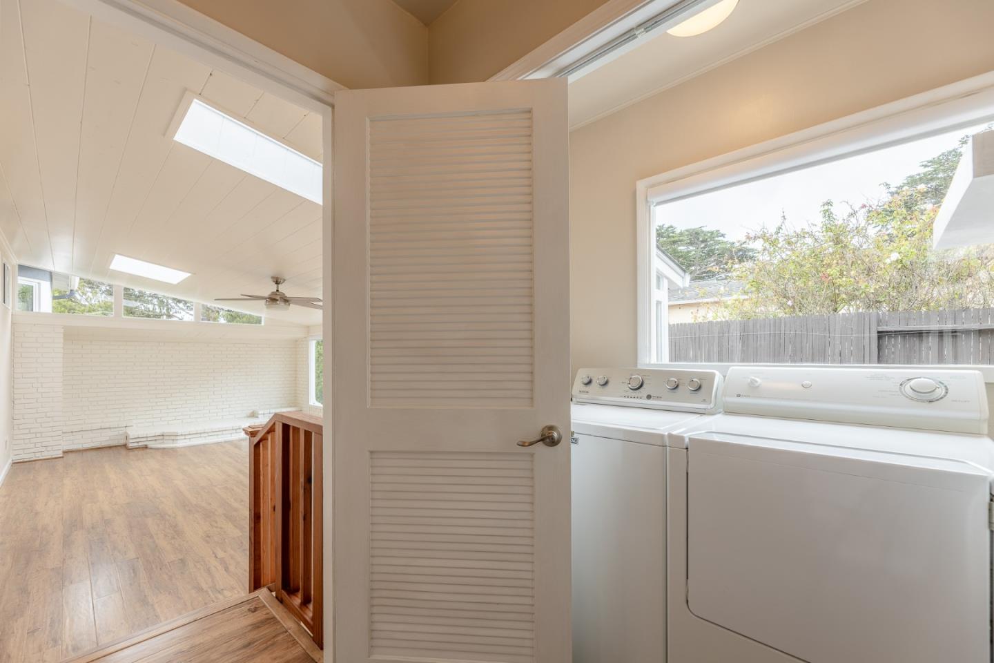 1130 Ripple Avenue Pacific Grove, CA 93950 - Photo 25 of 38 a bathroom with a sink and a mirror