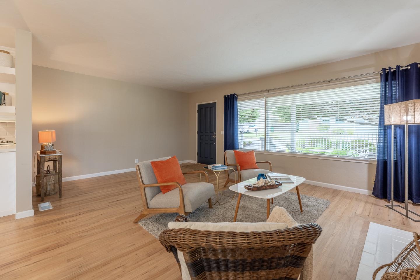 1130 Ripple Avenue Pacific Grove, CA 93950 - Photo 4 of 38 a outdoor living space with furniture and a window