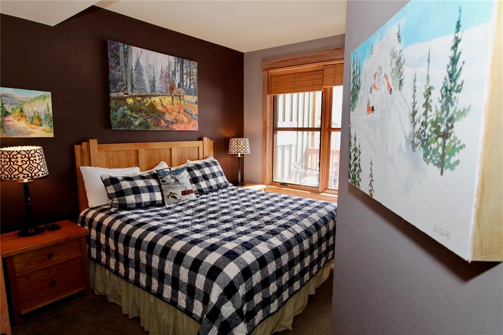 184 Copper Circle, Unit 524 Copper Mountain, CO 80443 - Photo 14 of 19 a bedroom with a bed and a window
